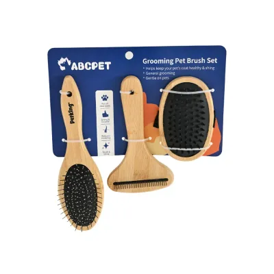 Front view of a three-piece bamboo dog and cat grooming brush set in retail display packaging.