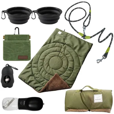 Complete Dog Travel Kit with Mat Leash Bowls and Water Bottle Complete dog travel kit with portable travel mat, leash, two collapsible bowls, water bottle, treat pouch and dog waste bag holder.