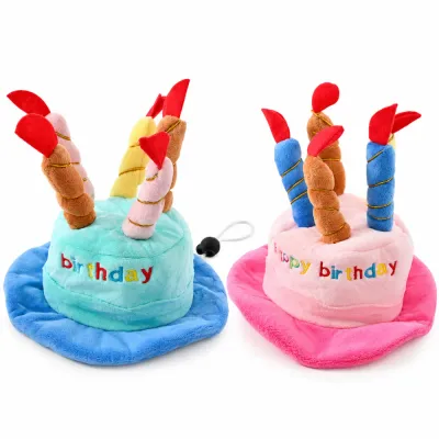 Blue and pink plush dog birthday hats with candle design and adjustable chin straps