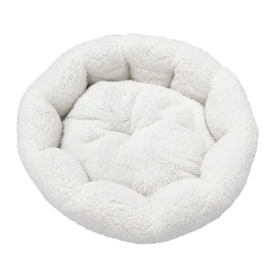 White round plush cat bed with thick cushioned center and raised supportive sides