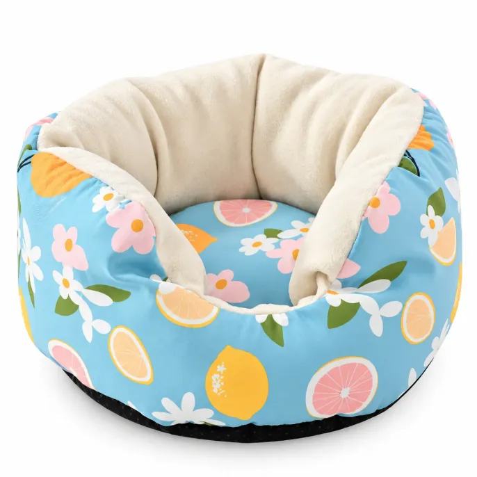 Blue Lemon Soft Plush Rabbit Sofa Bed with Anti Slip Base Blue lemon patterned small animal sofa bed with colorful citrus floral prints, cream plush lining, raised sides, and black anti slip base.
