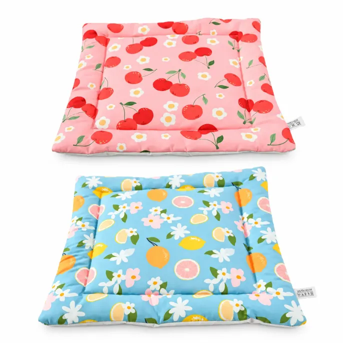 Soft Small Pet Beds in Pink Cherry and Blue Lemon Patterns Two soft padded small pet beds in pink cherry and blue lemon patterns featuring water repellent fabric and cushioned edges for rabbits and small animals.