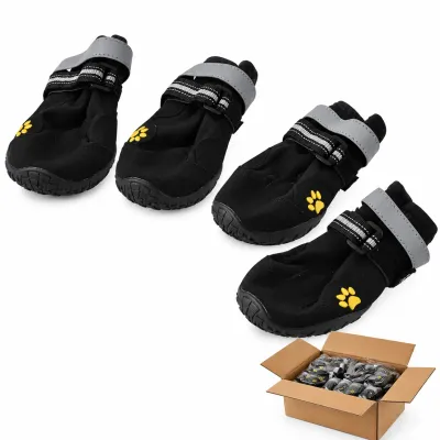Wholesale Black Dog Boots Four Piece Set with Bulk Packaging Four black protective dog boots with gray reflective straps, yellow paw embroidery and textured rubber soles displayed alongside a bulk shipping carton.