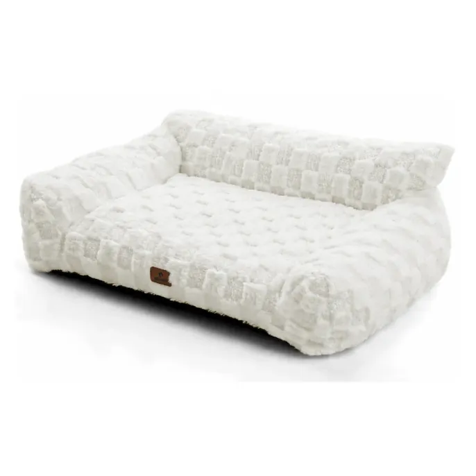 White Fluffy Pet Sofa Bed with Raised Cushioned Sides White fluffy pet sofa bed with textured plush fabric, padded bolstered sides and a soft rectangular sleeping area for dogs and cats.