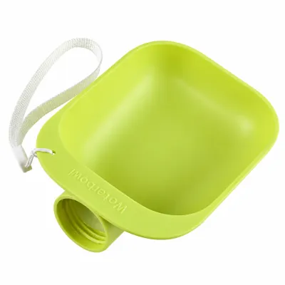 Lime green portable dog water bottle attachment with a built-in drinking bowl, threaded bottle connector and carrying strap on a white background.