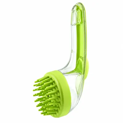 Green Silicone Pet Bath Brush with Soft Massage Bristles Green silicone pet bath brush with flexible massage bristles, a transparent handle, and a curved ergonomic design displayed on a white background.