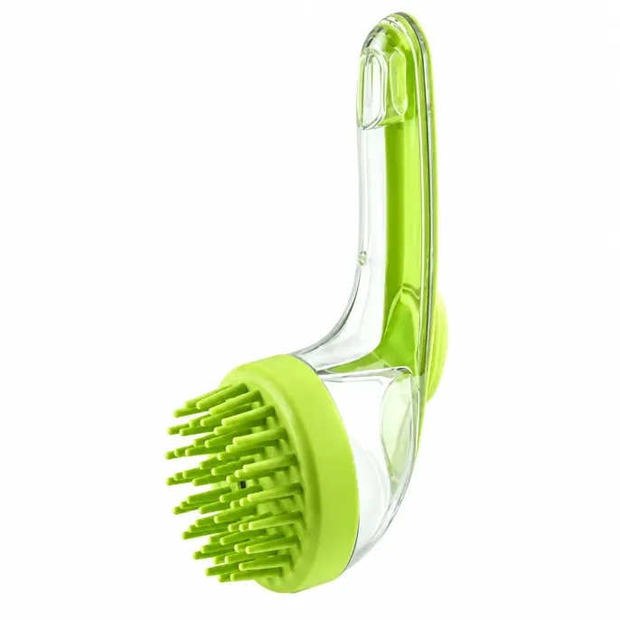 Green Silicone Pet Bath Brush with Soft Massage Bristles Green silicone pet bath brush with flexible massage bristles, a transparent handle, and a curved ergonomic design displayed on a white background.