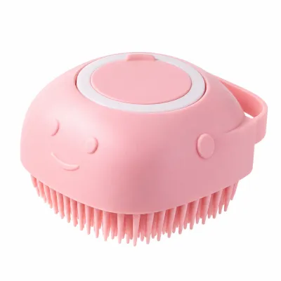 Pink Silicone Pet Bath Brush with Soft Massage Bristles Pink silicone pet bath brush with soft flexible bristles, a rounded ergonomic design, and a convenient hand strap for grooming dogs and cats.