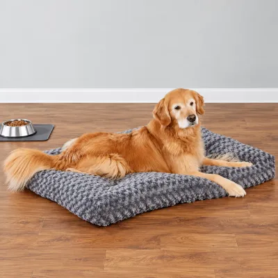 Extra Large Plush Dog Bed for Golden Retrievers Golden Retriever resting on an extra large gray plush dog bed with a soft cushioned surface in a living room.