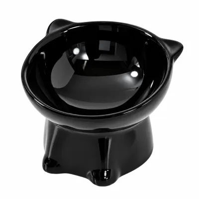 Black Raised Ceramic Cat Food Bowl with Cute Cat Ear Design Black elevated ceramic cat food bowl with a glossy finish, cute cat ear design, and raised pedestal base on a white background.